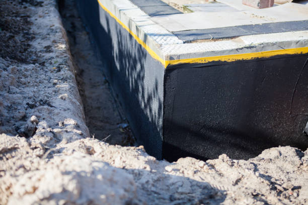 Professional Waterproofing technician working in Brightwood, VA